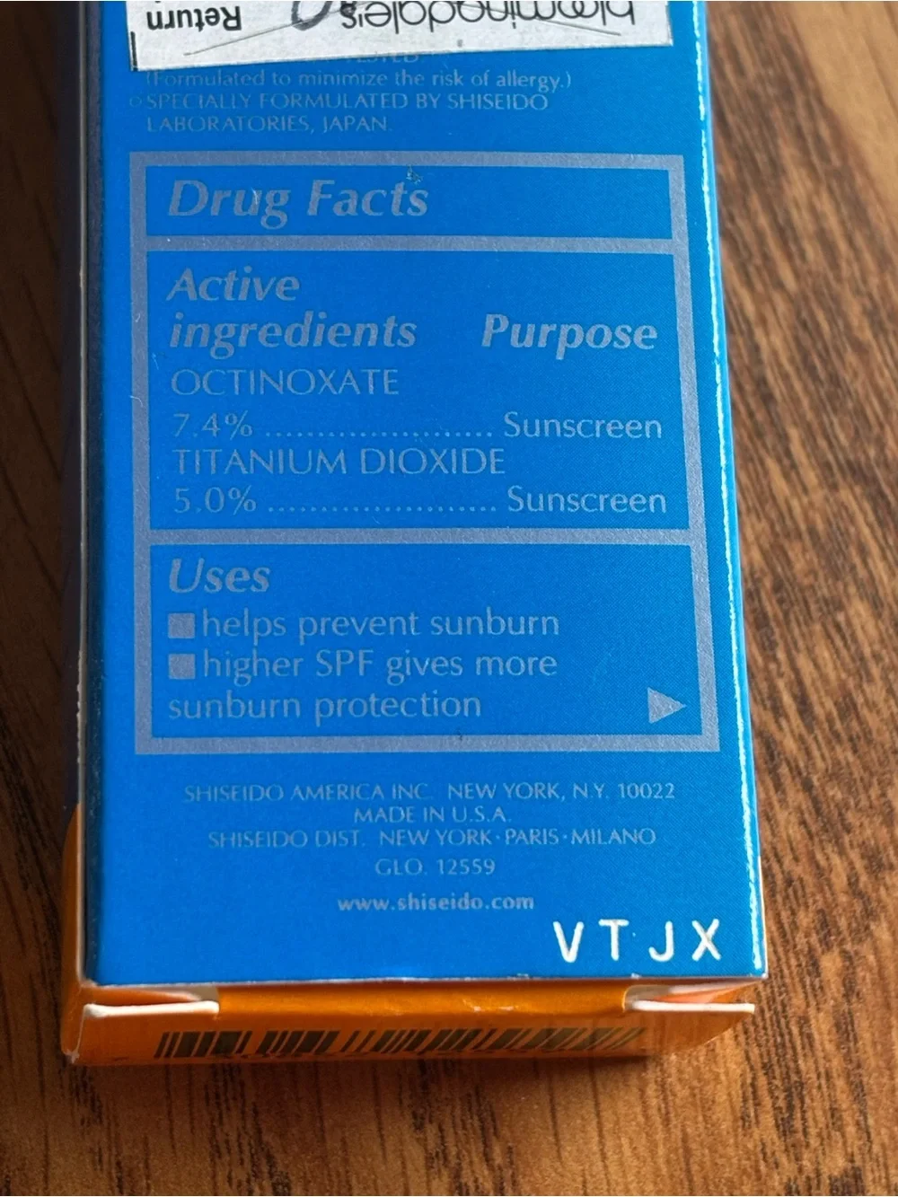 Shiseido Sun Protection Lip Treatment SPF 36 - 14 oz. Teal and Gold
